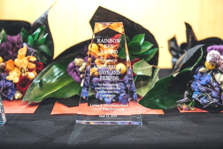 A/PGF representatives holding the 2019 Rainbow Key Award