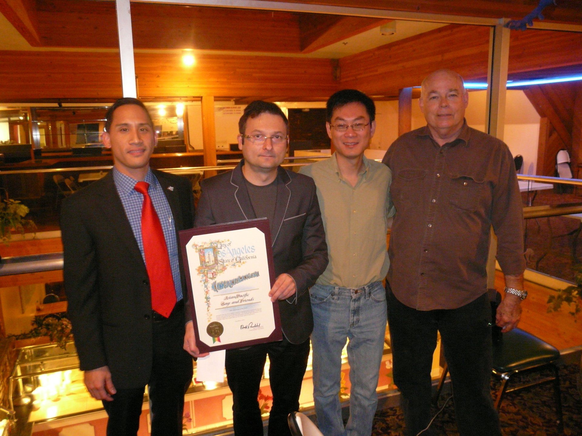 The City of Los Angeles sends CONGRATULATIONS to Asian/Pacific Gays and Friends on our 30th Anniversary (1980-2010). Presented by Len Nguyen, (left) representing Bill Rosendahl, Councilmember of the 11th District to President Rokas O, Treasurer Jack G and Secretary Dan D at our Anniversary Dinner on December 5th